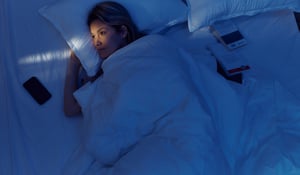WOman dealing with sleep issues because of long covid