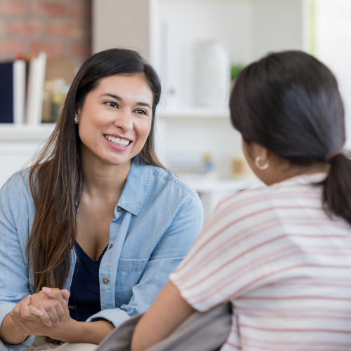 teen talking to an older adult