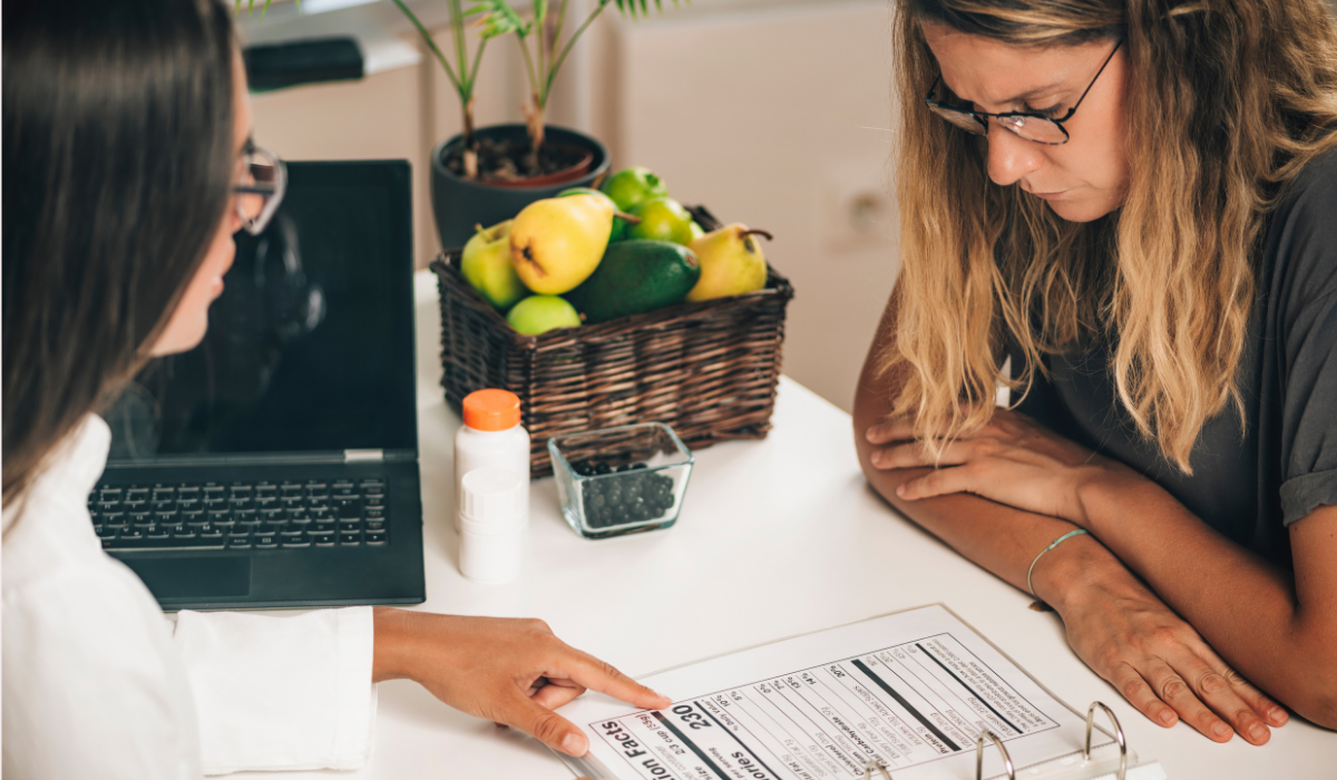 Person with chronic kidney disease working with a registered renal dietitian to plan the best foods for their kidney health