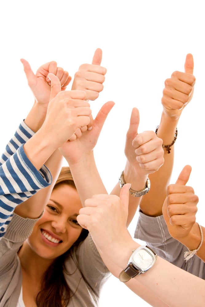 Thumbs up isolated over a white background