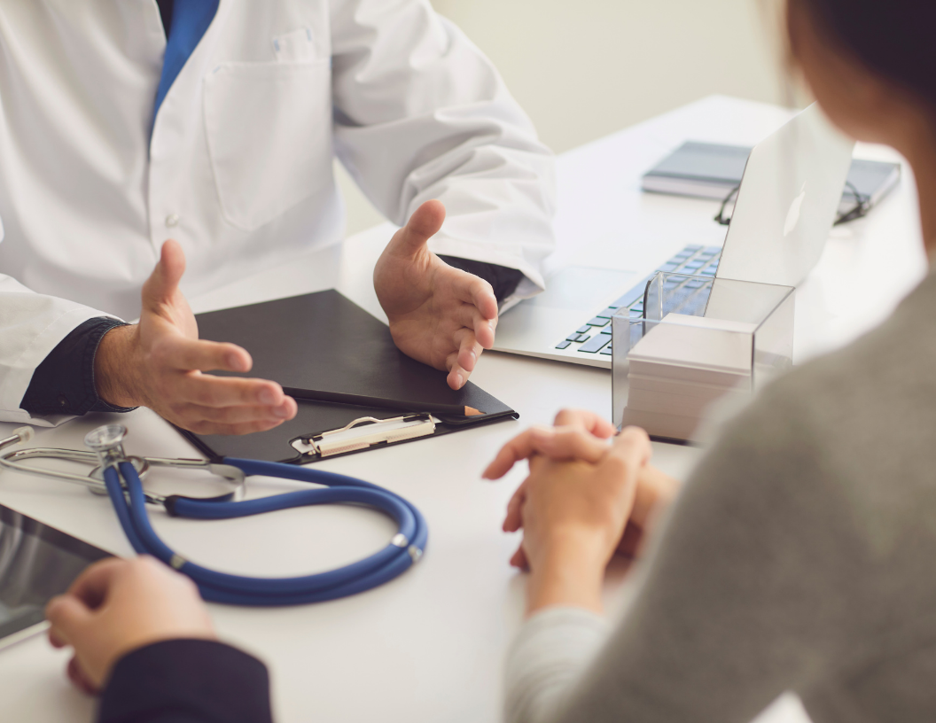 doctor talking to patient