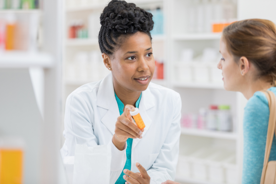 pharmacist consulting patient